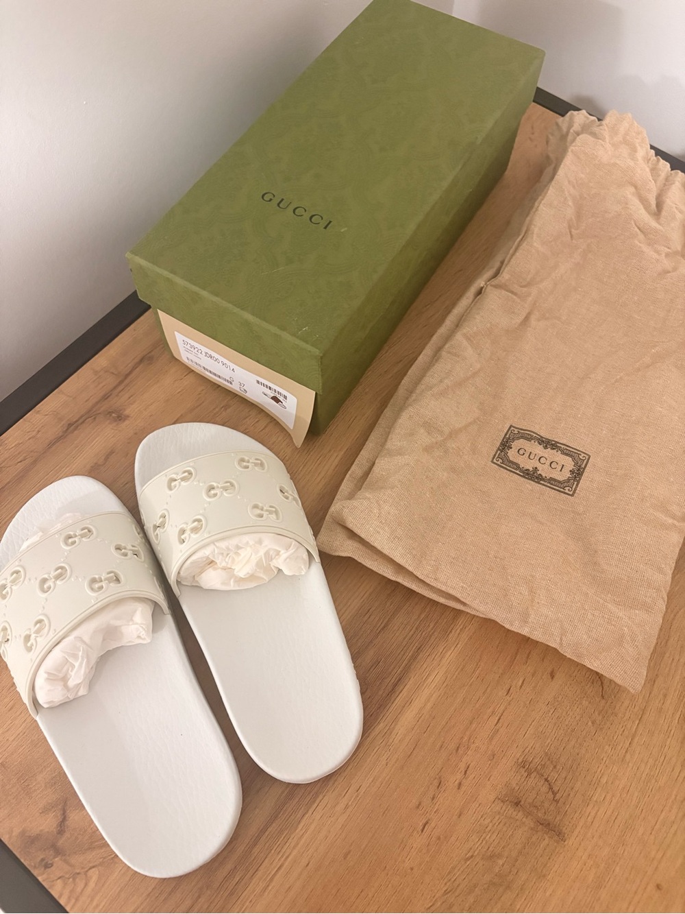 Gucci Cream GG Embossed Slide Sandals